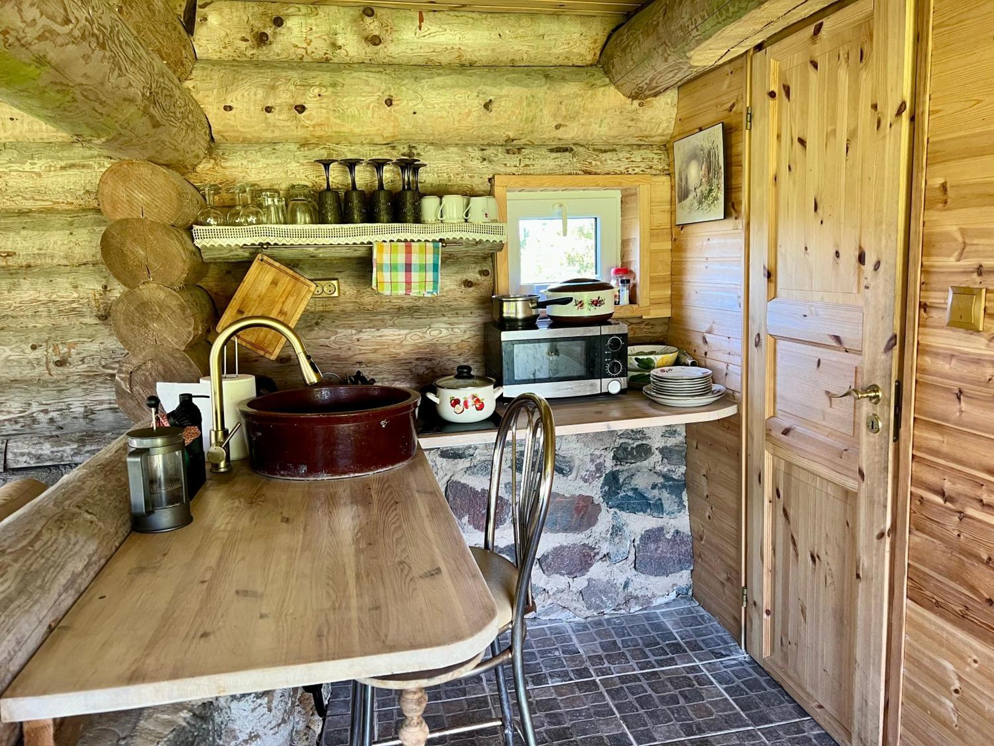 Hotel Suurekivi Kuelalistemaja Reigi Esterno foto